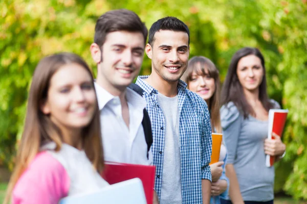 Group of students outdoor Royalty Free Stock Photos