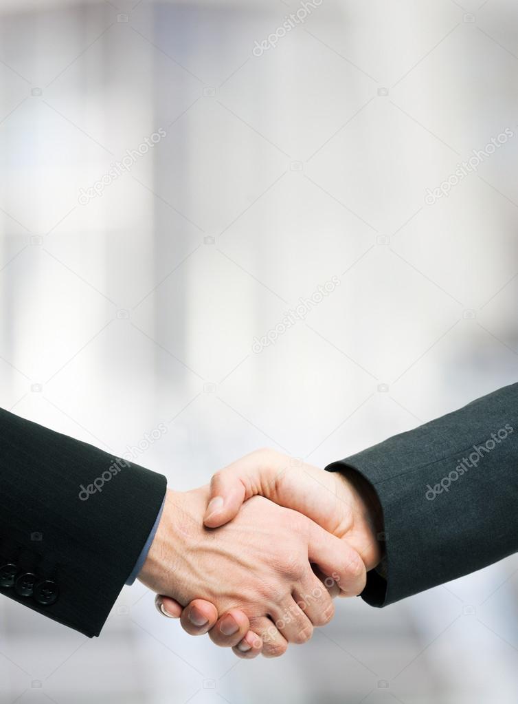 Business people shaking hands