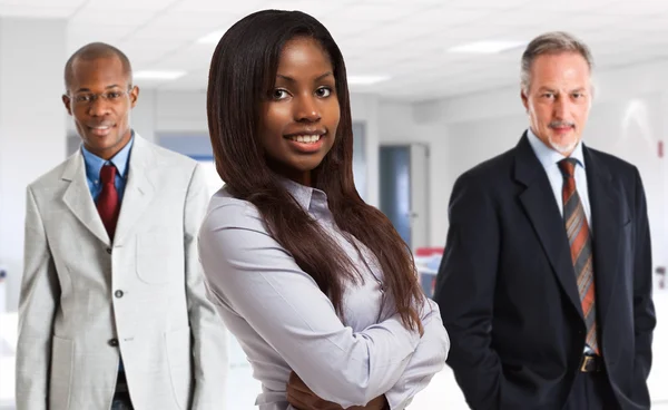 Businesswoman standing in office — Stock Photo, Image