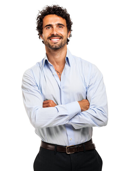 Businessman with crossed arms smiling