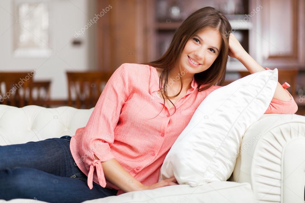 woman relaxing on couch