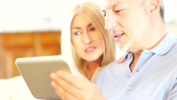 Couple using digital tablet — Stock Video