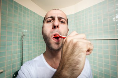 man brushing his teeth clipart