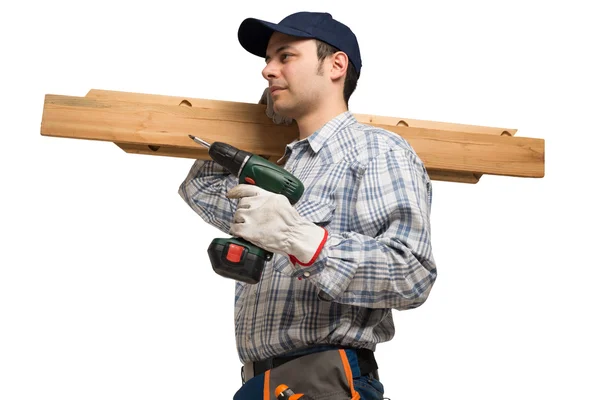 Carpenter holding wood planks — Stock Photo, Image