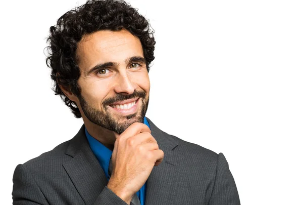 Homem sorridente pensativo — Fotografia de Stock