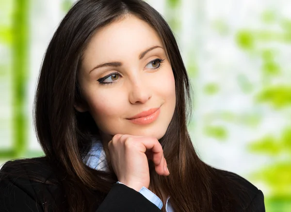 Woman in a pensive expression — Stock Photo, Image