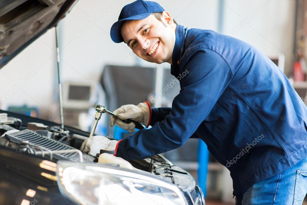 Mechanic at work in garage