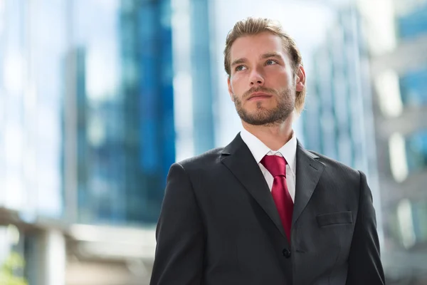 Businessman in a business environment — Stock Photo, Image