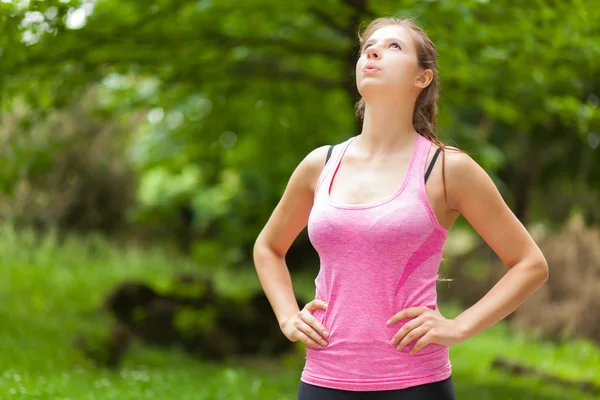 Woman resting after running — Stock Photo, Image