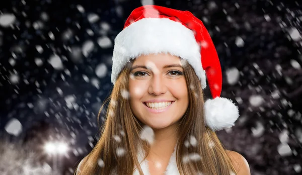 Девушка в одежде Санта-Клауса — стоковое фото