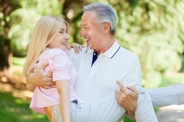 Mature couple having fun — Stock Photo, Image