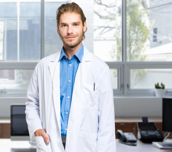 Handsome doctor in hospital — Stock Photo, Image