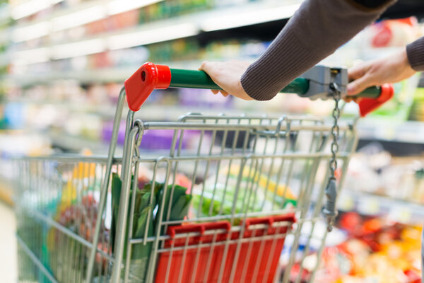 woman driving a shopping cart