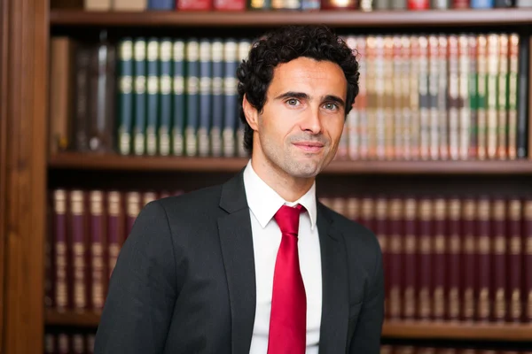 Smiling businessman in his office — Stock Photo, Image