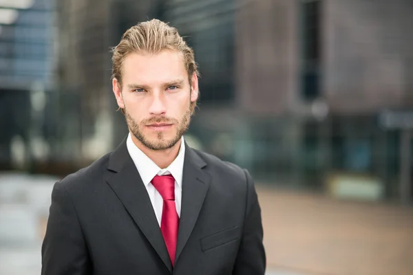 Businessman in a business environment — Stock Photo, Image