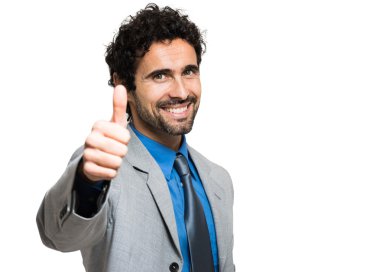 başparmak veren gülümseyen iş adamı