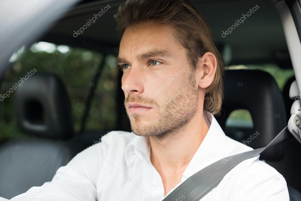 Man driving his car
