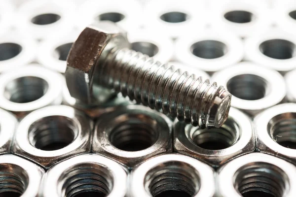 Metal nuts and a bolt — Stock Photo, Image