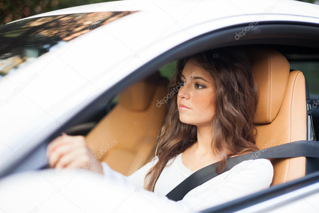 Woman driving her car
