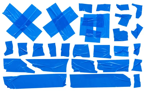 ブルースコッチテープ 白を背景に様々な形状の接着テープの砕いた破片のセット高解像度 — ストック写真