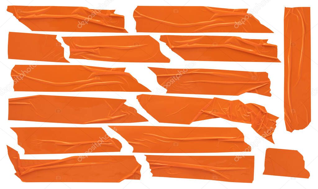 Orange construction scotch, shiny sticky strips of stationery tape, self-adhesive tape set of various sizes isolated on white background