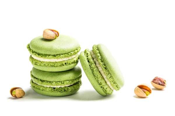 Sweet macaroons with pistachio on white background — Stock Photo, Image