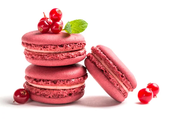 Fresh macaroons with red currant on white background — Stock Photo, Image