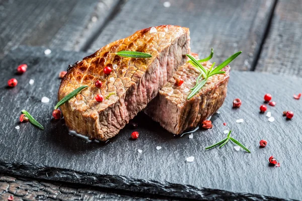 Hot grilled meat with fresh herbs — Stock Photo, Image