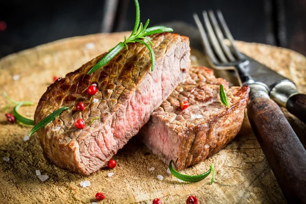 Roasted steak with herbs and spices — Stock Photo, Image