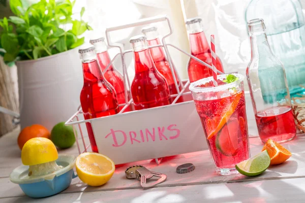 Tasty red orangeade with mint leaf — Stock Photo, Image