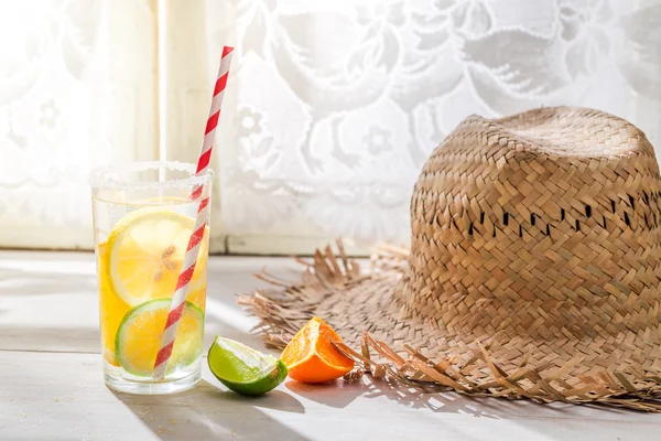 Tasty drink with lemon and orange — Stock Photo, Image