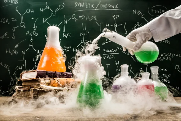 Checking the chemical formula in academic laboratory — Stock Photo, Image