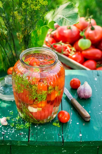 Fresh cherry tomatoes in the jar — Stock Photo, Image