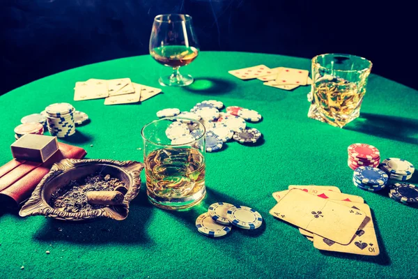 Closeup of gambling table with chips and cards — Stock Photo, Image