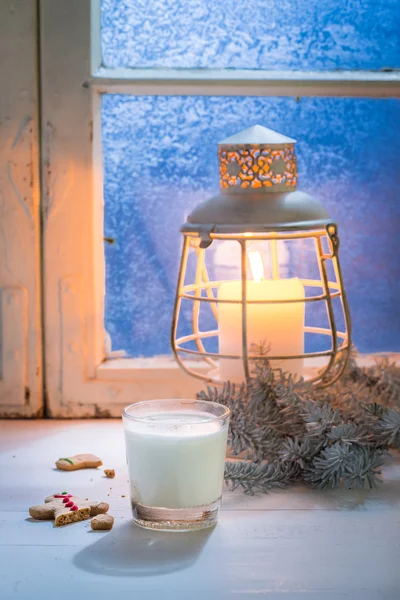 Homemade and sweet cookies with milk on white table for Christmas — Stock Photo, Image