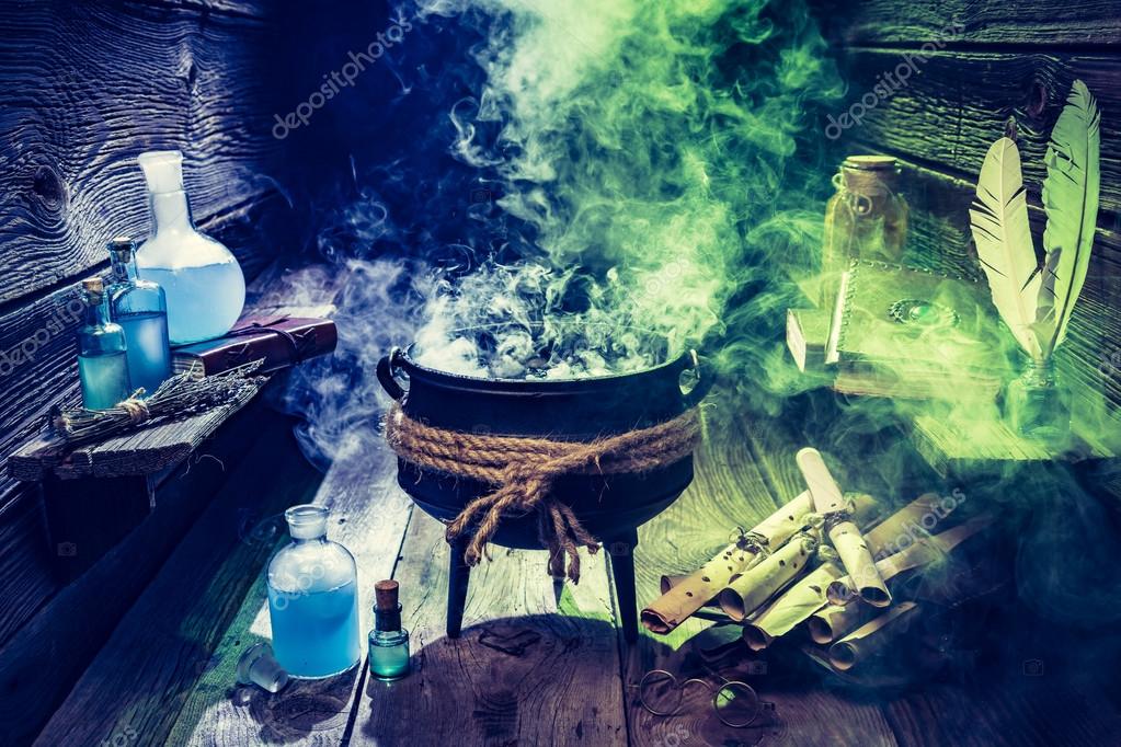 Magical witcher cauldron with blue and green smoke for Halloween ...
