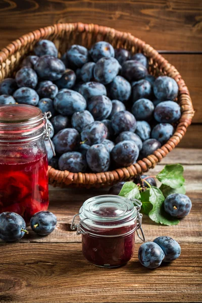 Fresh preserves from plum in the pantry — Stock Photo, Image