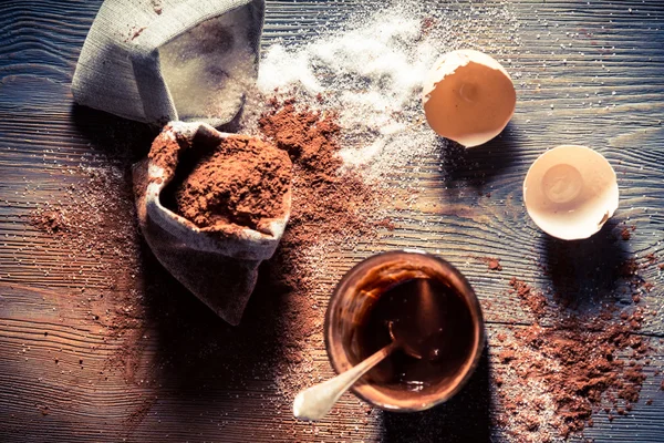 Taste of childhood, egg yolk with sugar and cocoa — Stock Photo, Image