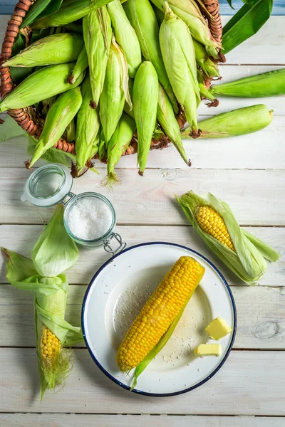 Fresh hot corn served with butter — Stock Photo, Image