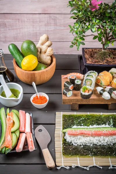 Table with ingredients for sushi — Stock Photo, Image