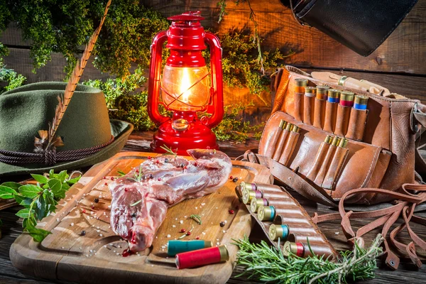 Fresh venison prepared for roasting in hunter lodge — Stock Photo, Image