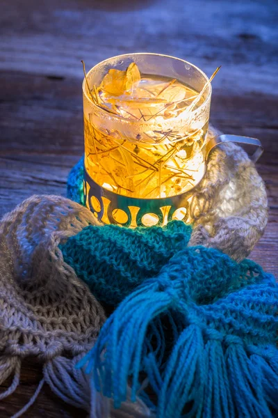Glass full of linden warming tea — Stock Photo, Image