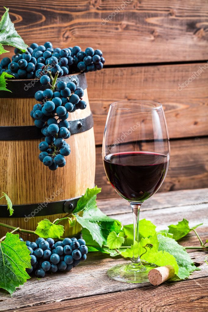 Red grapes and a glass of red wine Stock Photo by ©Shaiith79 53633153