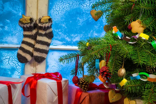 Christmas cottage full of gifts — Stock Photo, Image