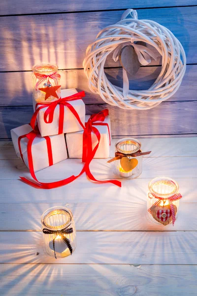 Candles and gifts for Christmas — Stock Photo, Image