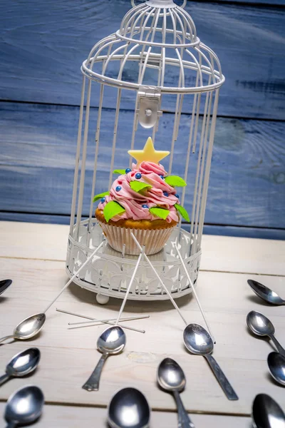 Muffin in a small cage — Stock Photo, Image