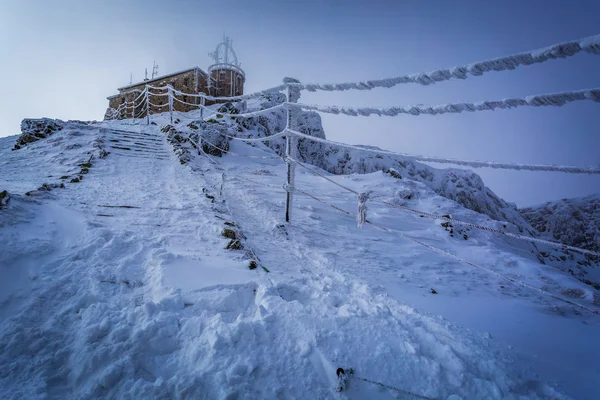 Weather station in the mountains in winter — Stock Photo, Image