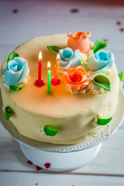 Three candles on birthday cake — Stock Photo, Image