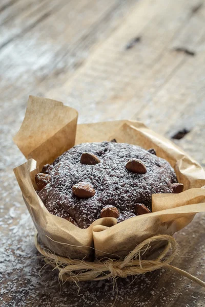 Closeup of chocolate muffin with sugar — Stock Photo, Image