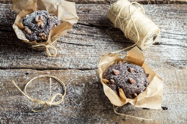 Sweet muffins wrapping with string — Stock Photo, Image